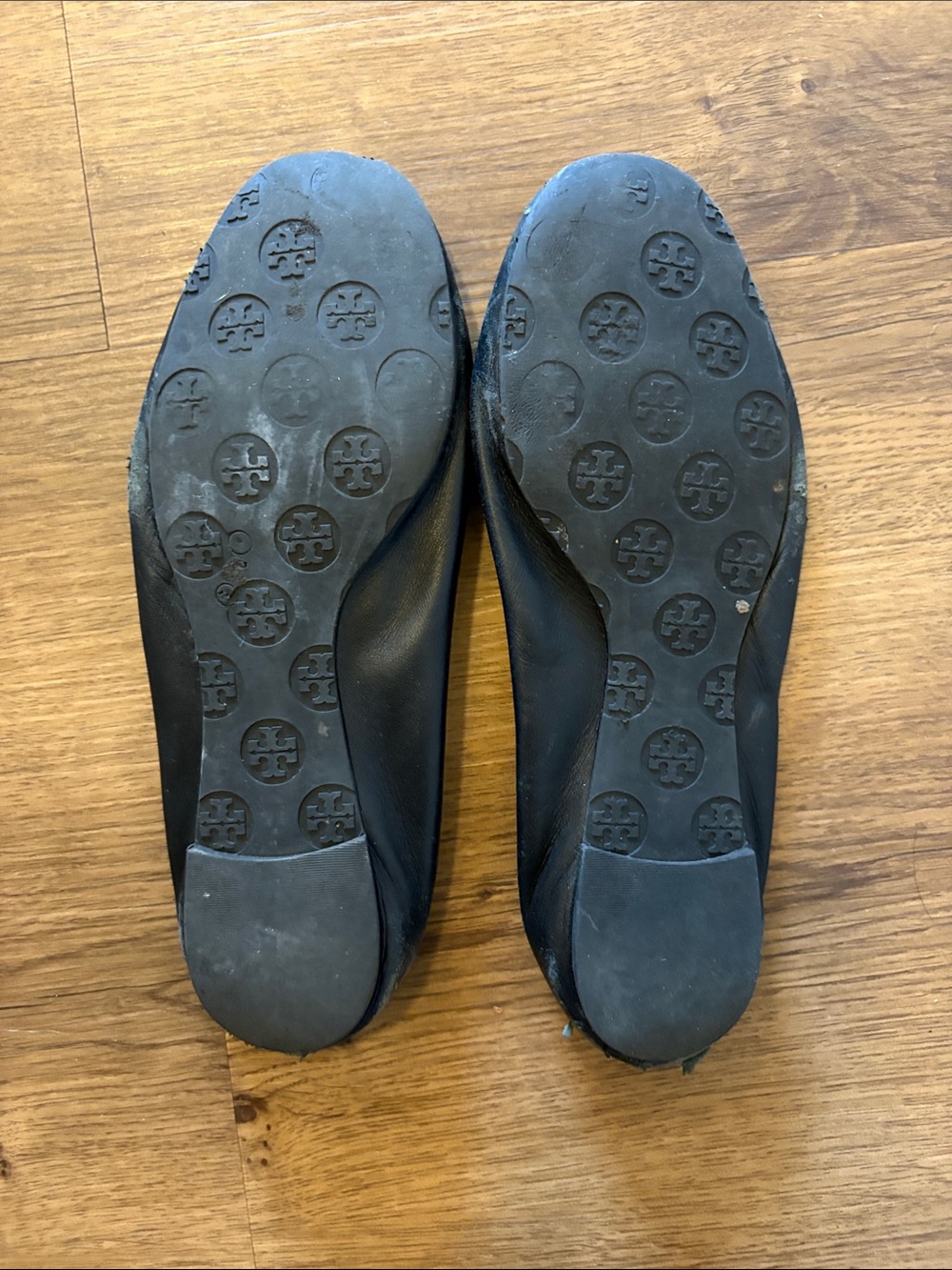 Tory Burch Black Leather Logo Round-Toe Flats with Gold Medallions - Picture 2 of 5